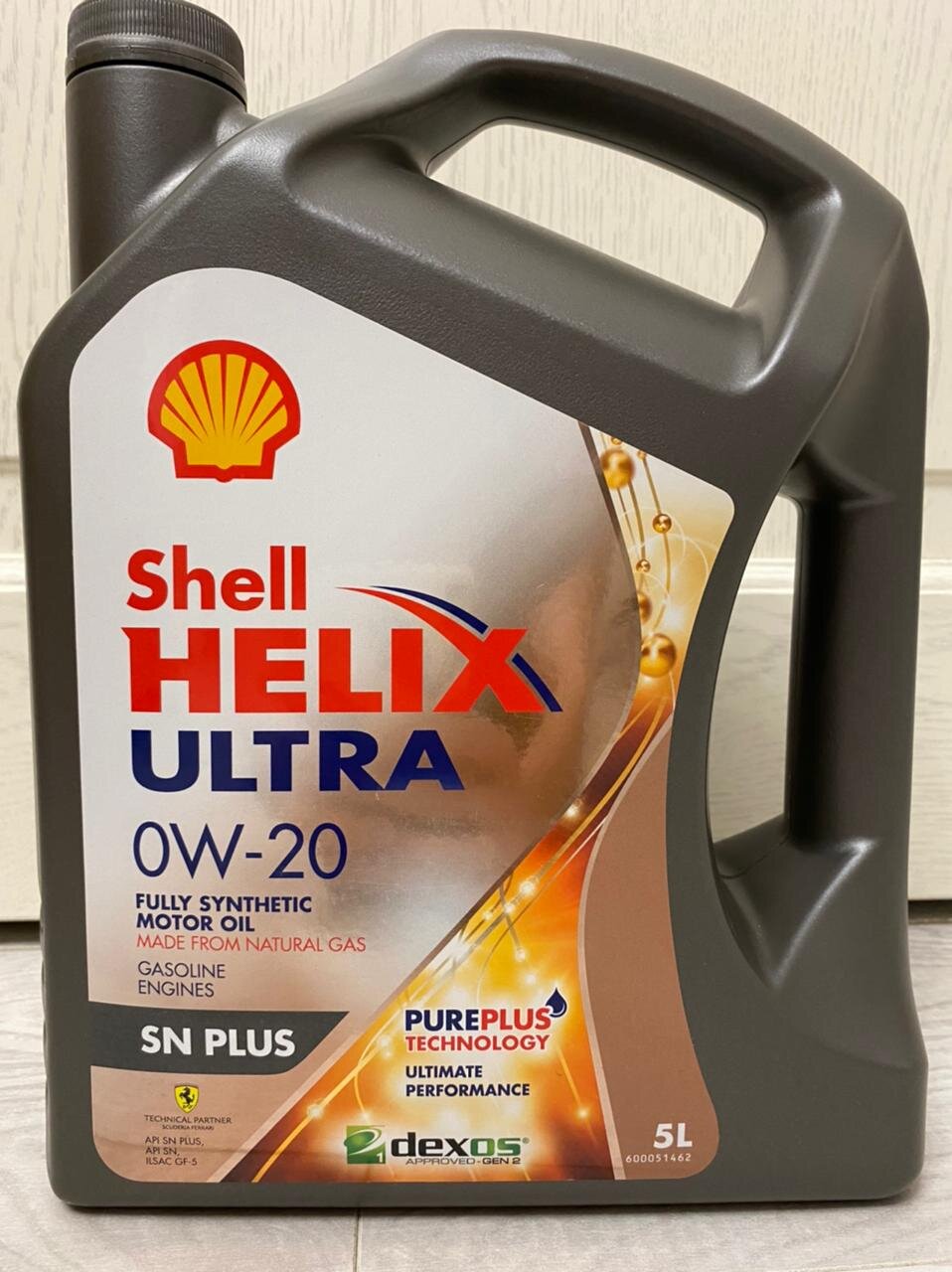 Sn plus 0w 20. Shell Ultra SN Plus 0w-20. Шелл ультра 0w20 SN Plus. Shell 0w20 SN Plus. Моторное масло Шелл Хеликс 5w40.